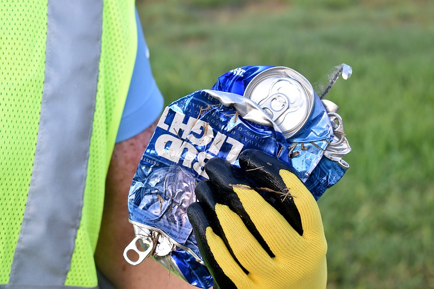 The group picked up beer cans along Gulf of Mexico Drive.