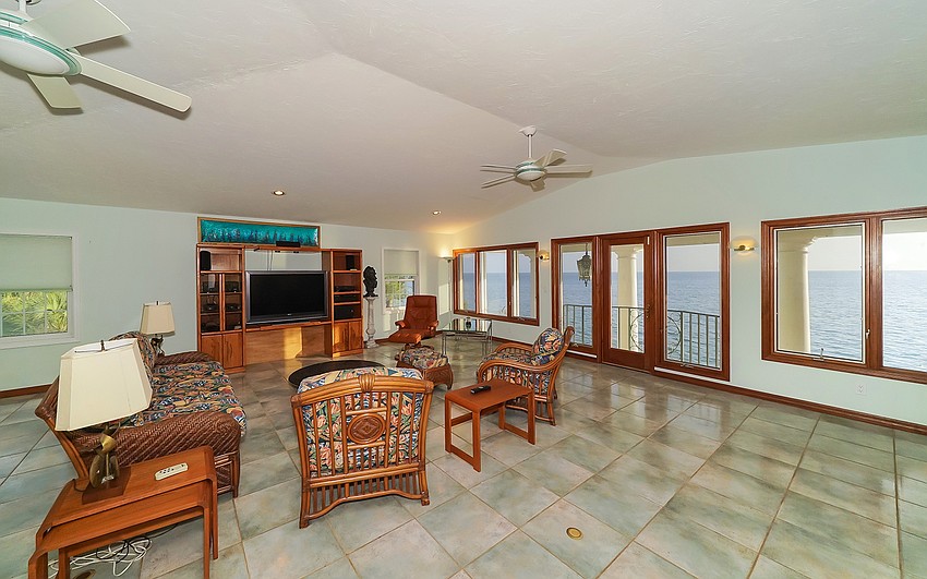 The guest home features waterfront views.