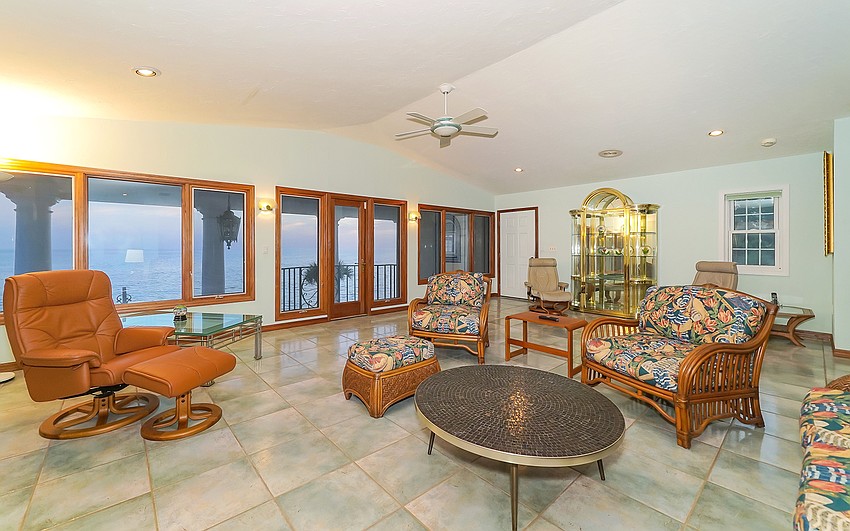 The guest home features waterfront views.