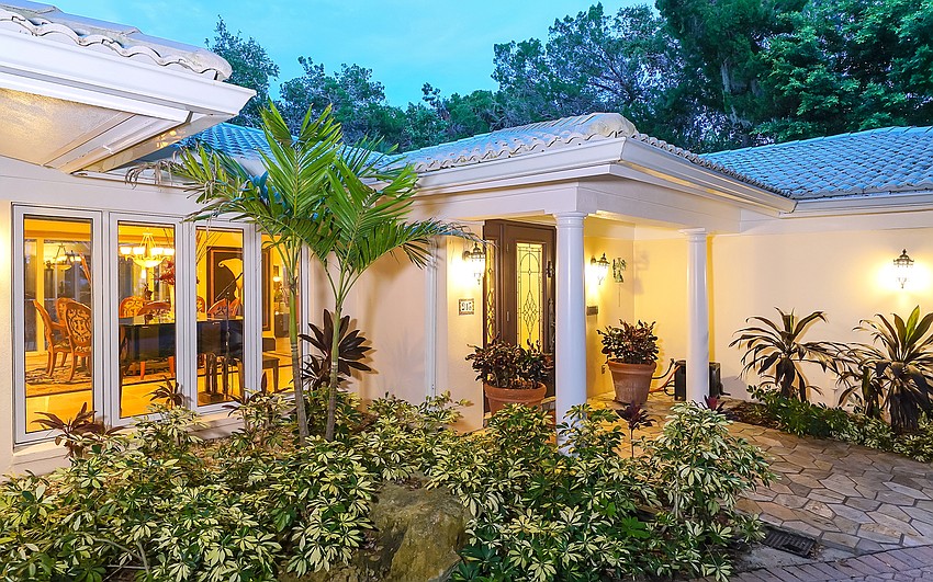 The home at 916 N. Casey Key Road features three bedrooms and two bathrooms.