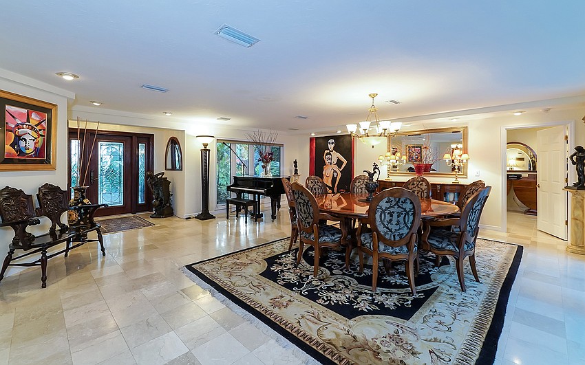 The main home features marble flooring in the great room.