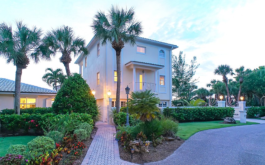 The three-story guest house overlooks the gulf.