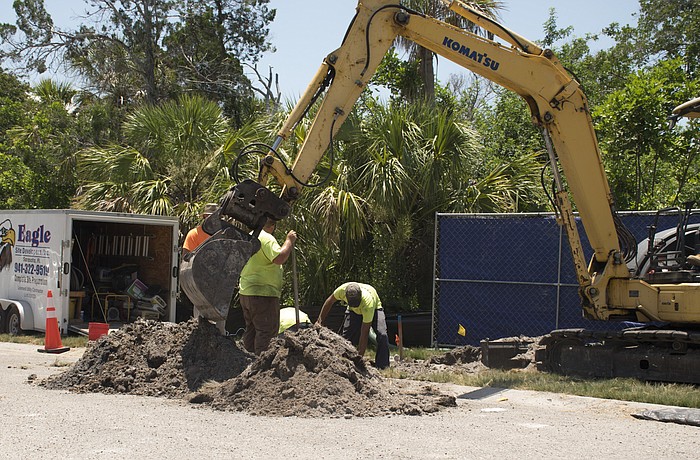 Contractors cut a gas line on Binnacle Point Drive Tuesday afternoon.