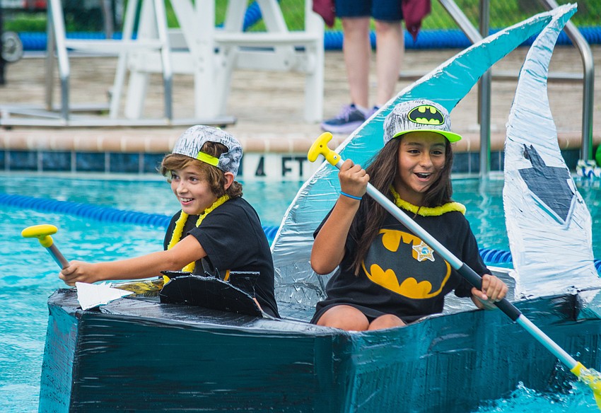 Rykey L. and Jessibel R. attempt to maneuver their Batman-inspired vessel.