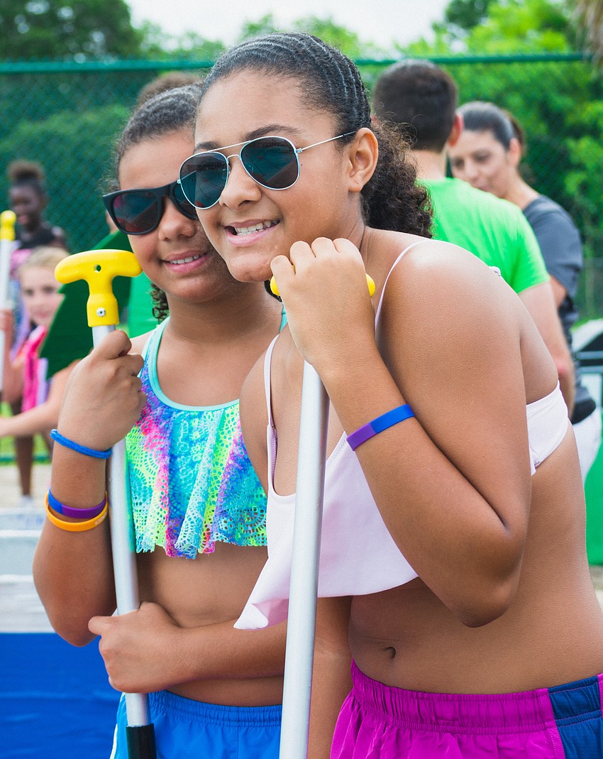 Alyssia B. and Janiel W. get ready to test out their boat.