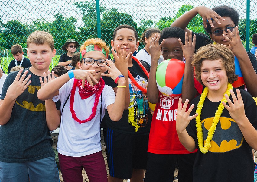 Caidon C., Reynaldo P., Pedro A., Zay E., Jaylen V. and Ryker L. cheer on the teams.