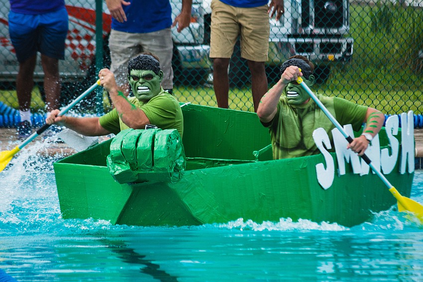 Boys and Girls Club President Bill Sadlo  and his son, Billy Sadlo, Jr., compete in the CEO race.
