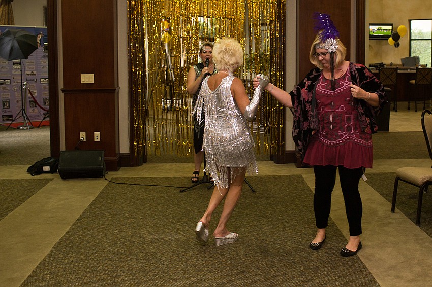 Chacha Sunshine and Cindy Christo Brown dance to Veronica Miller's music.