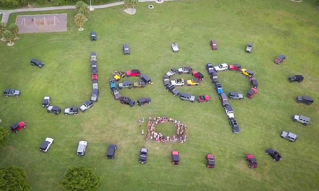 Jeep owners used their vehicles to spell "Jeep." Photo taken by Zack McNally of Bayside Media.