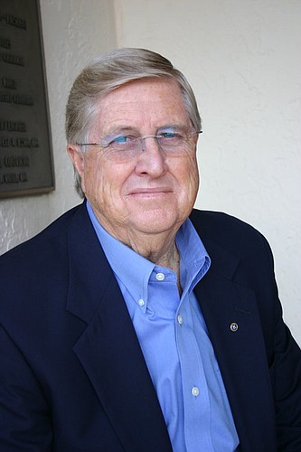 Country Club Shores resident and undergrounding utilities supporter Bob Gault is ready to bury utilities in his neighborhood.