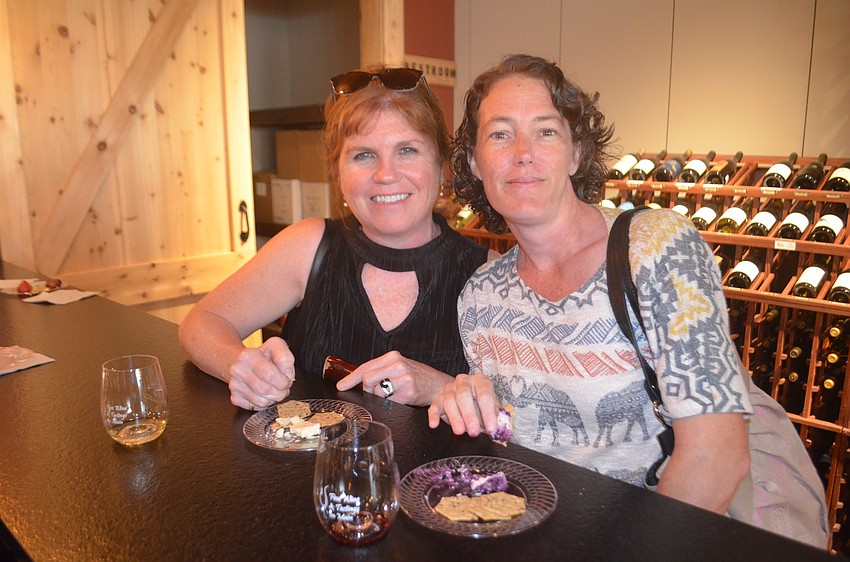 Parrish's Karen Fullerton and Donna Jeter enjoyed their stop at Fine Wine and Tastings on Main Street.