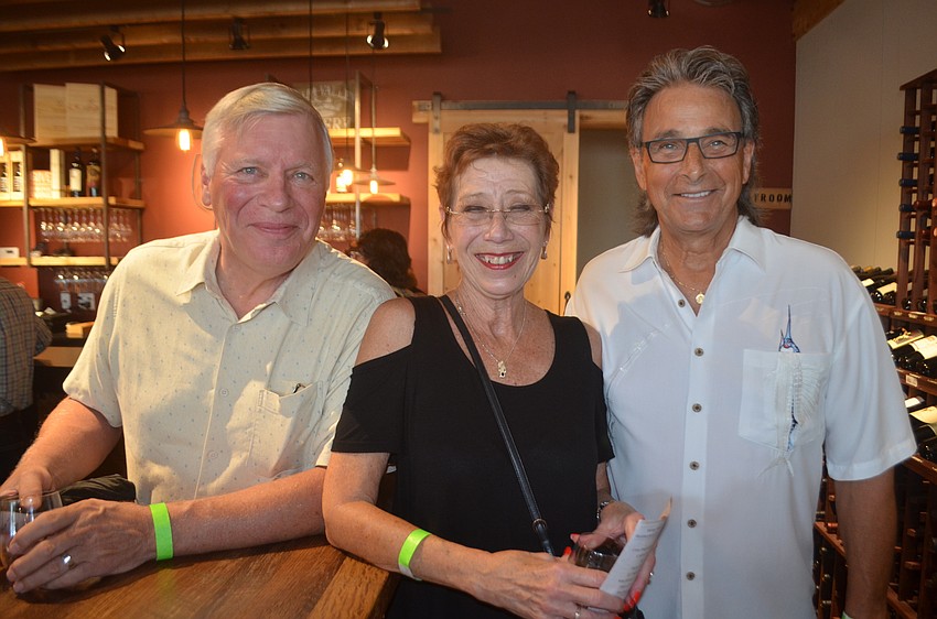 River Club's David and Dawn Bach  and Bill Strauss came to Wine Walk Wednesday because their friend, Dawn Bach, works at Wish.
