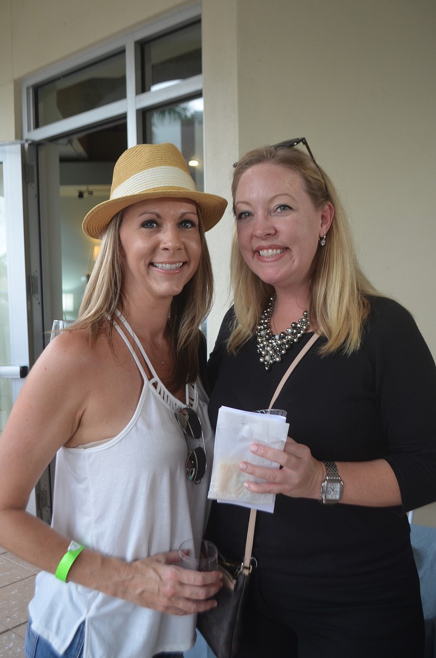 Lakewood Ranch's Holly Sharma and Jill Gartman say they stopped at some of the shops for the first time during Wine Walk Wednesday.