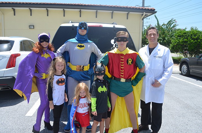 Mattie Bedinghaus, Hermione Bedinghaus, Carter Bedinghaus, Princess Bedinghaus, Channing Bedinghaus, Camden Bedinghaus and Dr. Troy Bedinghaus had a good time with the "Batman" theme.