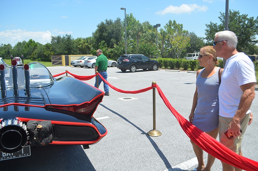 Bradenton's Paul and Denise Paska didn't plan on coming to the event, but they saw the Batmobile as they drove past and had to pull over.