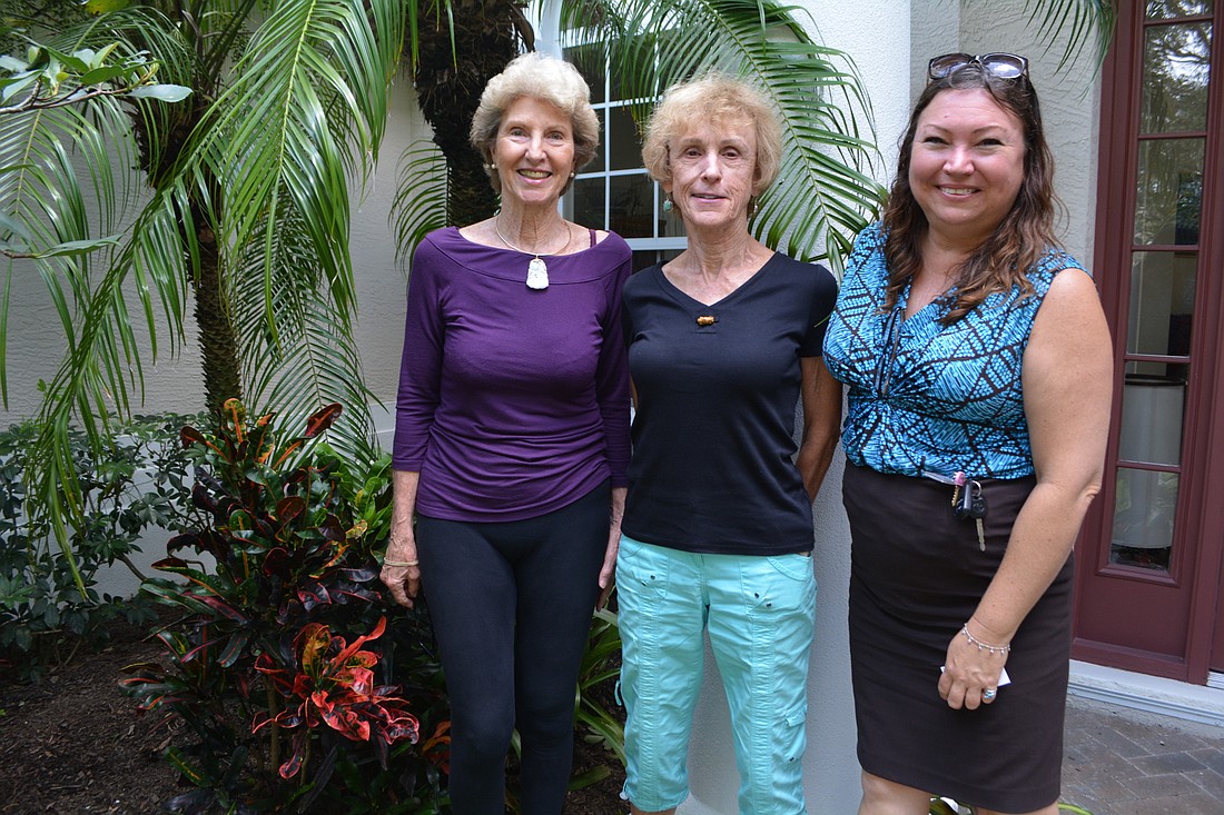 University Park&#39;s Polly Curran and Maureen Hager, pictured with University of Florida IFAS Manatee County Extension Office agent Susan Griffith, hope neighbors in University Park will make their yards Florida friendly.