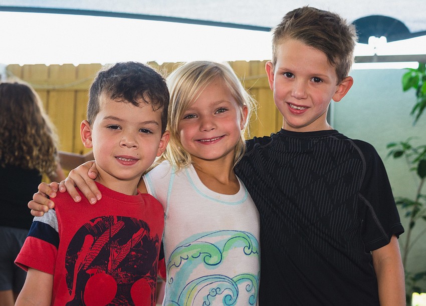 Jaxson and Henry Phinney with Giulia Lunardi, center.