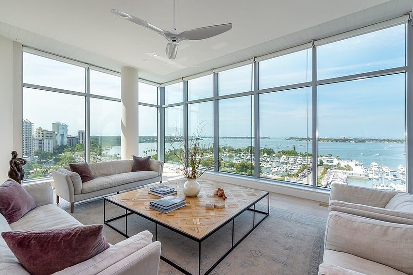 The Jewel unit's living room has two-sided views of Sarasota Bay and downtown.
