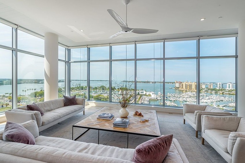 The Jewel unit's living room has two-sided views of Sarasota Bay and downtown.