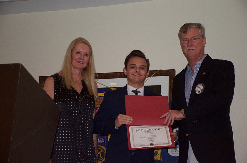 Zachary Phillips joins Susan Phillips and Steve Branham on stage.