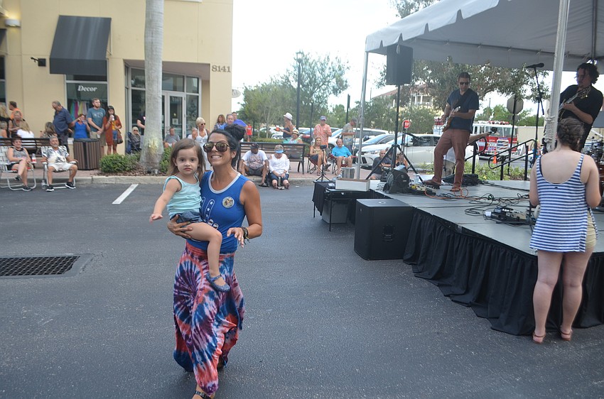 Riverwalk's Julia Dunn, 2, and Alyssa Martin are neighbors who came to Music on Main to dance together.