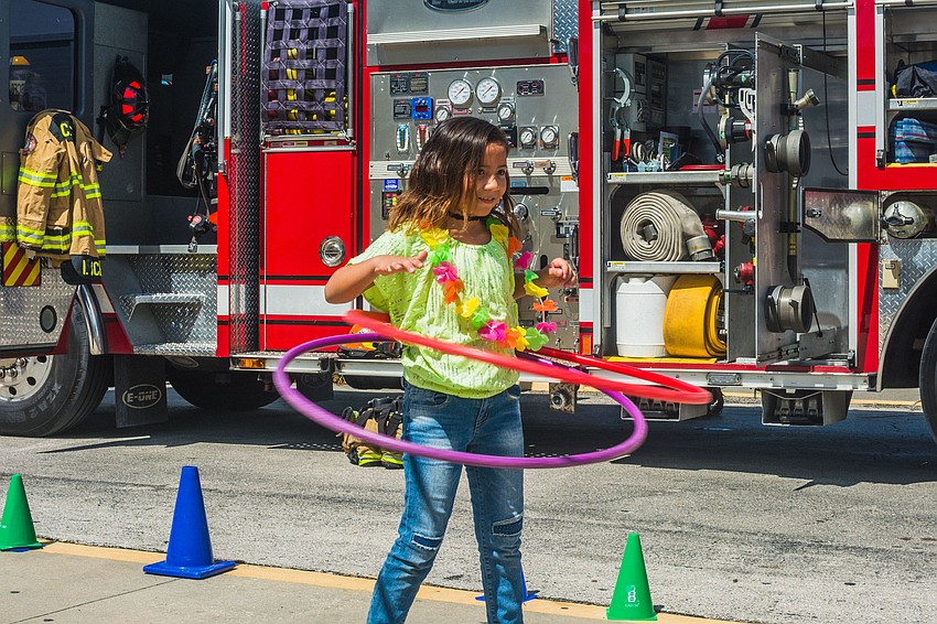 Itzel Baty shows of her hula hooping skills.