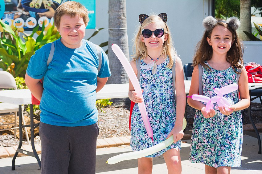 Michael Bellofatto with Cyan Barrett and Ava Ward.