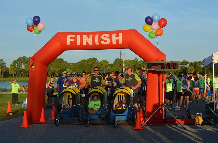 Care 2 Tri volunteers led the race.