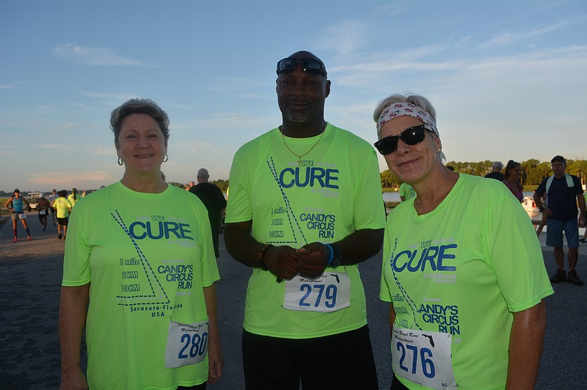 Karen Kidd, Robert Harris and Sabine Aeberhard represent PPI Technologies in Sarasota.