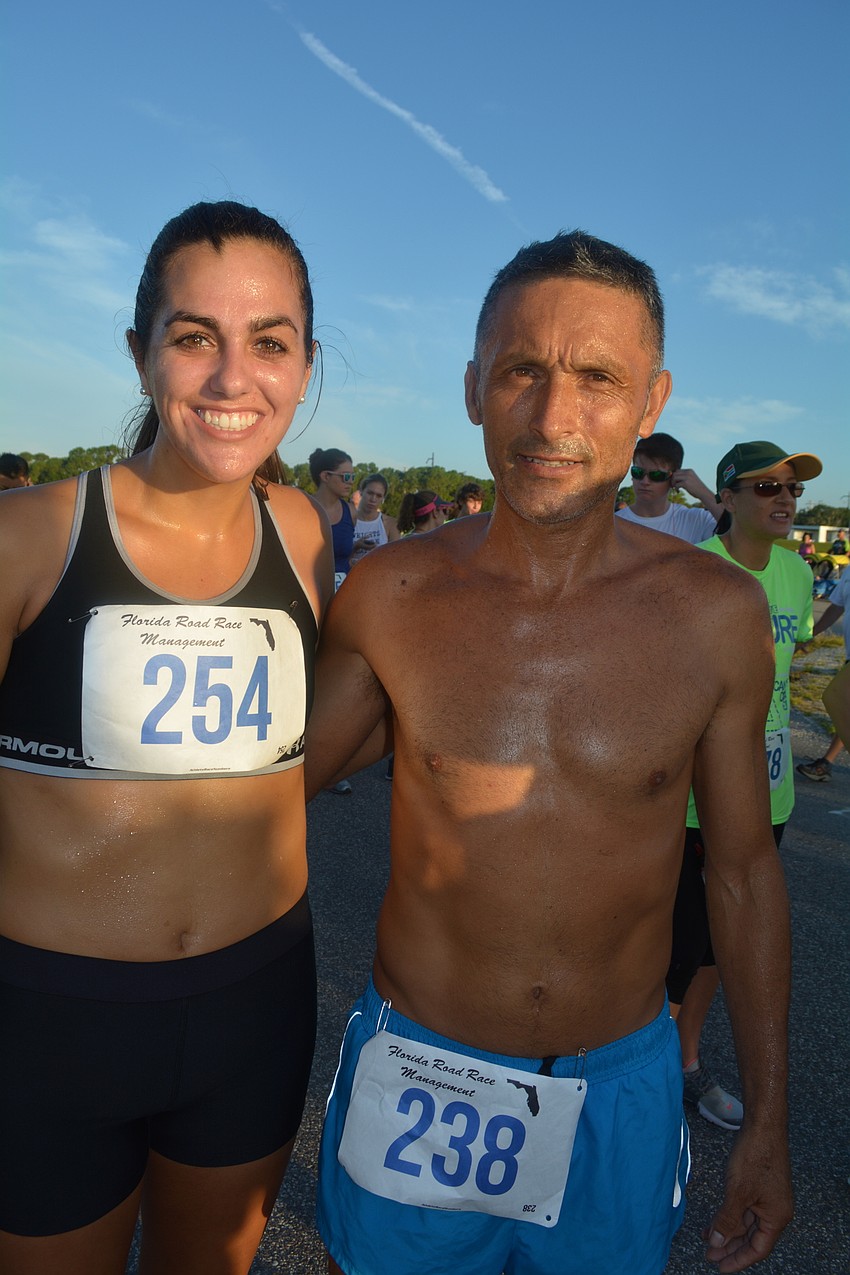 Lakewood Ranch's Karah Ohalloran and Hector Guzman run together every day and complete their first race together.
