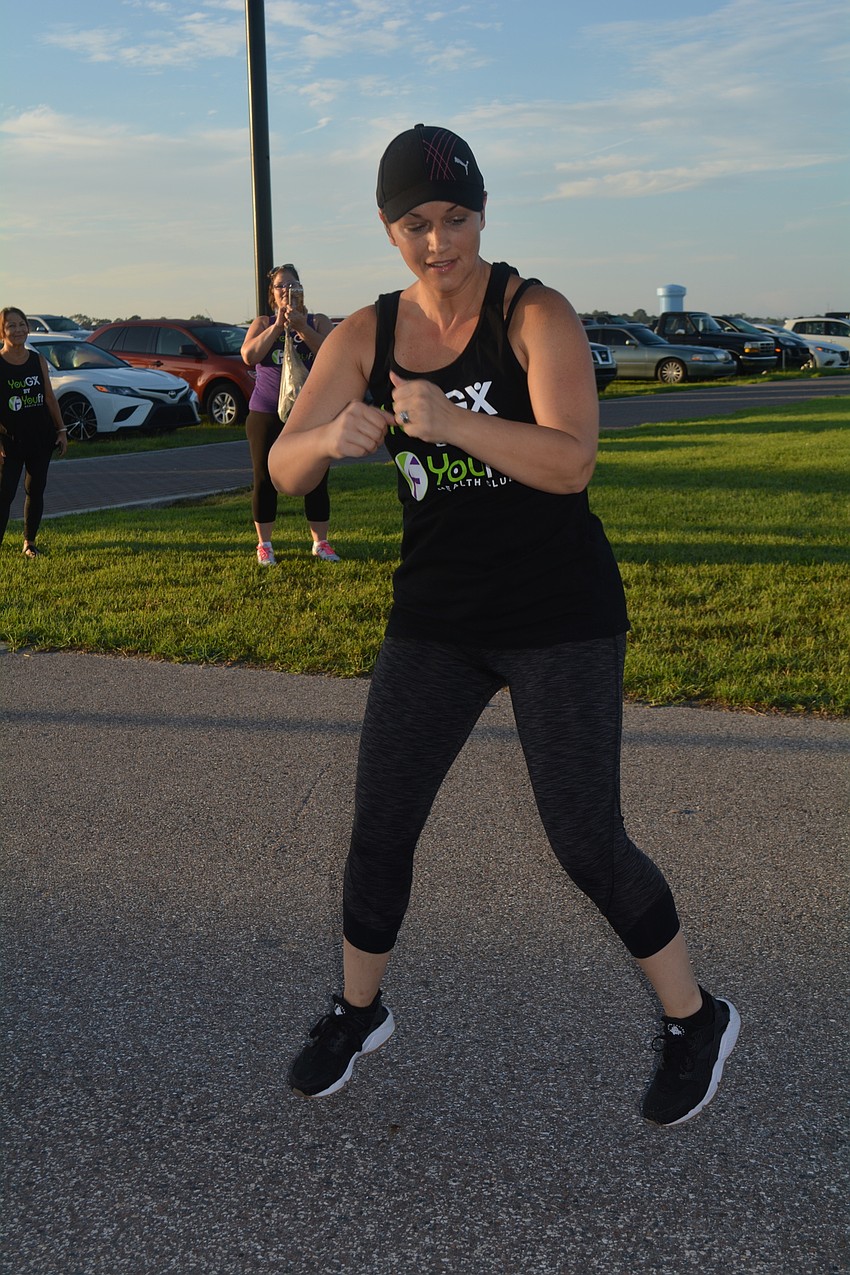 Youfit instructor Suzanne Stinson does a 