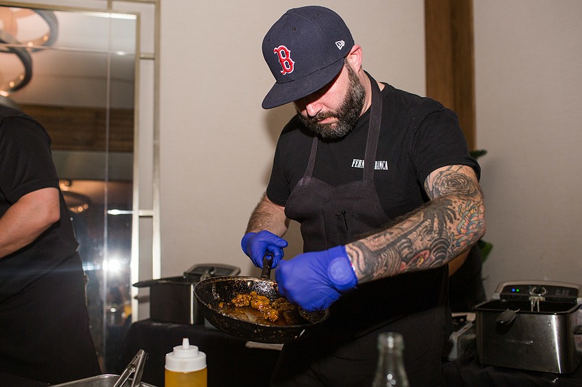 Nick Vaccaro serves plates of fried Louisiana oyster from Made.