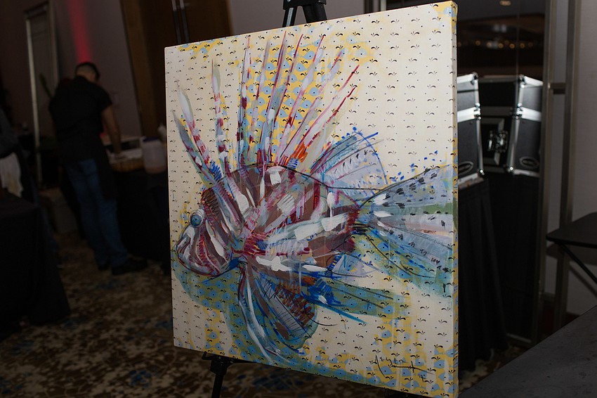 Tim Jaegar donated two paintings for a silent auction.