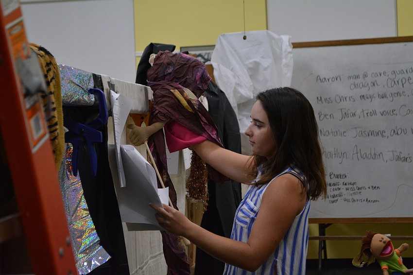 Lakewood Ranch High School senior Natalie Robson portrays Princess Jasmine with her puppet.