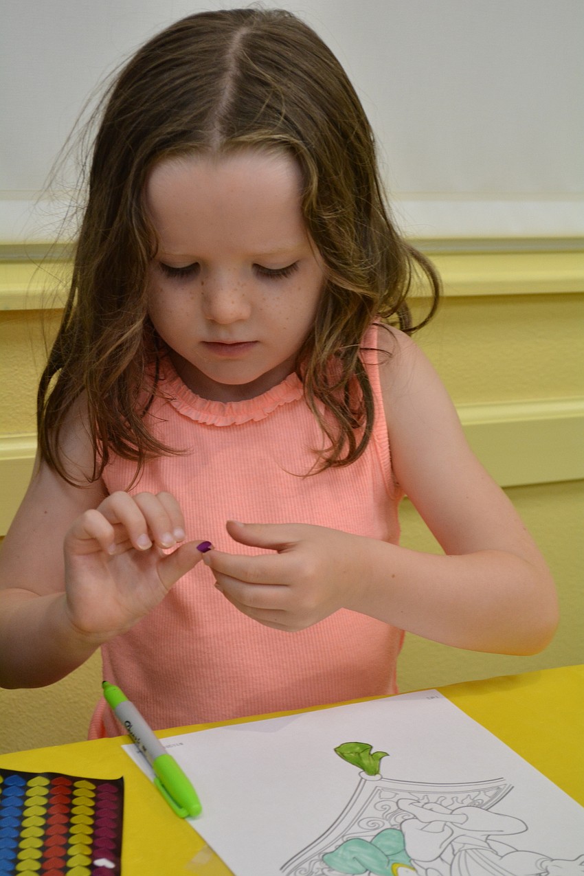 Emilia Simkins, 4, is visiting her grandparents — Sabal Harbour's John and Linda Simkins — from the United Kingdom.