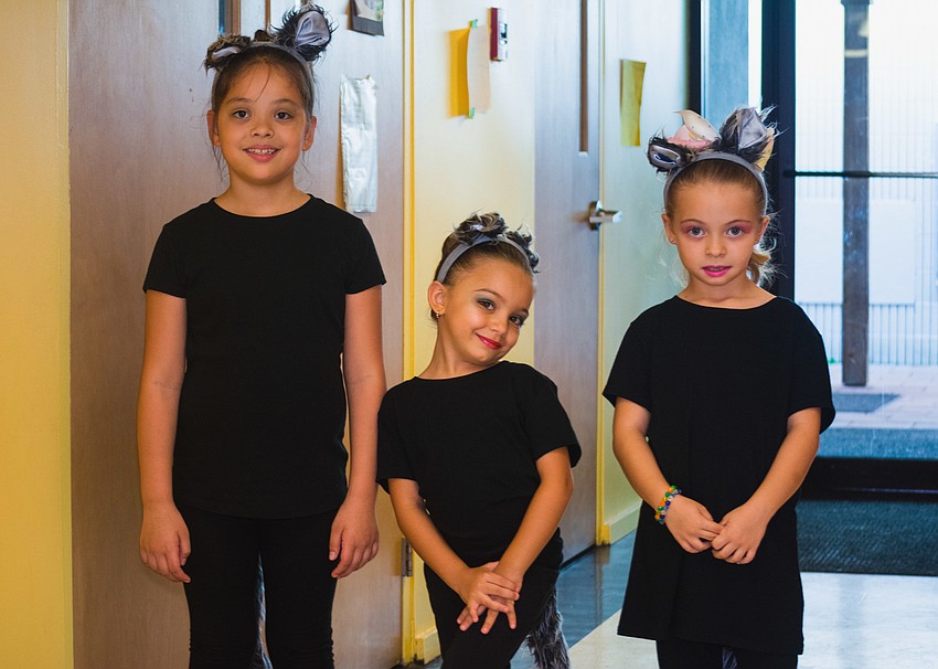 Ava, Lilly and Matilda play the wolves.