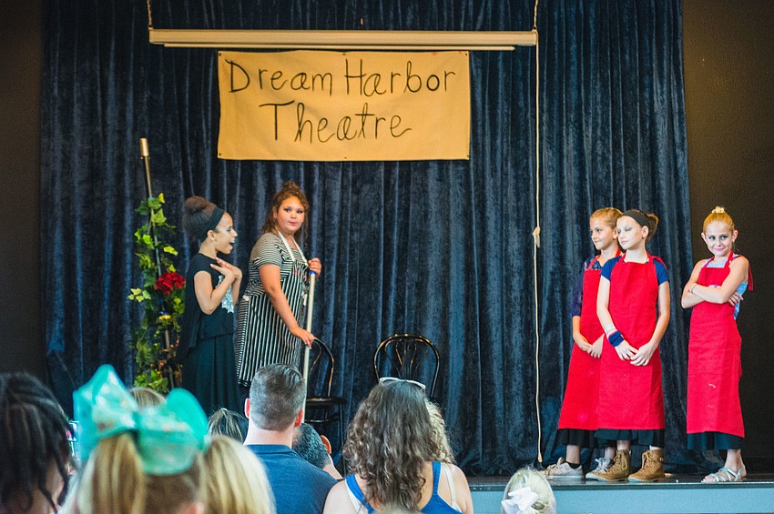 Girls Inc. perform the opening scene of Beauty and the Beast.