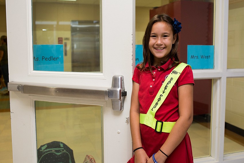 Lizzie Maney, a safety patrol officer for the first day of school at Southside Elementary.