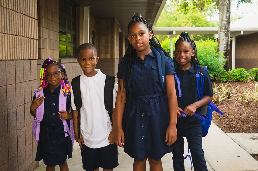 Emma E. Booker Elementary students Janyla Soloman, Tarico Thompson, Kemira Soloman and John'tavia Solomon