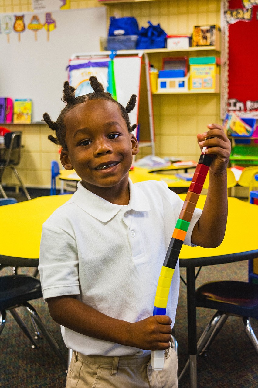 Emma E. Booker Elementary kindergartner Tarrance Timmons plays with building blocks before class starts.