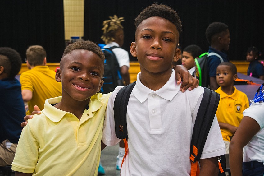 Emma E. Booker Elementary student Seven Peterson with his cousin Michael Peterson.