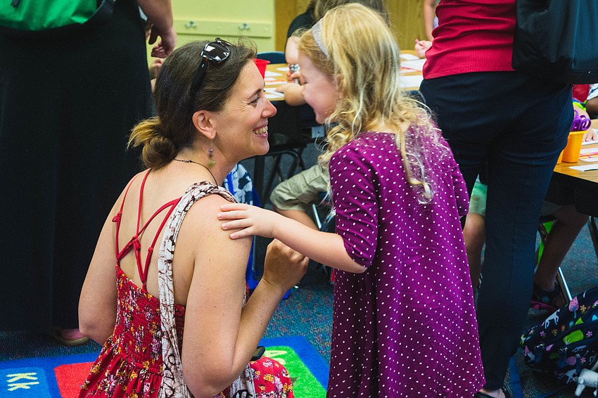Allison Goldy says goodbye to her daughter, Saffron, who started her first day of kindergarten at Bay Haven School of Basics Plus.