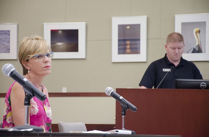 Irene Hagman, left, challenged Code Enforcement Officer Chris Elbon's citation for renting short-term in a residential neighborhood.