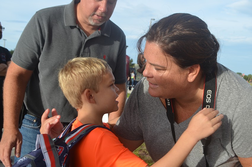 Luke Veerkamp, 5, gives his mom Jamie Veerkamp a kiss goodbye, Jamie Veerkamp says she's devastated.
