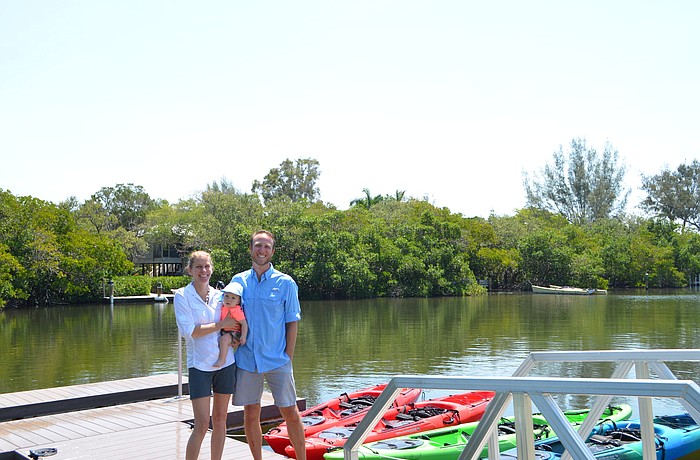 Shane Catts, right, his wife Holly Rolls own Happy Paddler Kayak Tours and EcoVentures