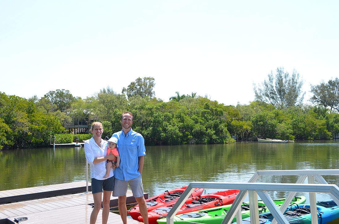 Shane Catts, right, his wife Holly Rolls own Happy Paddler Kayak Tours and EcoVentures