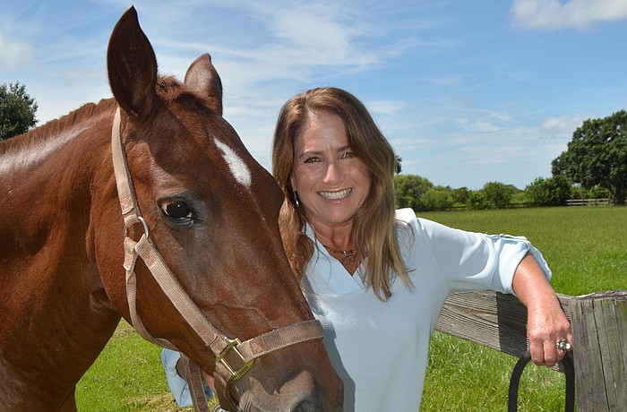 Jaymie Klauber spends time on her Polo Club ranch with 14-year-old Macarena. She has opened a new business, Epic Equine Experiences.