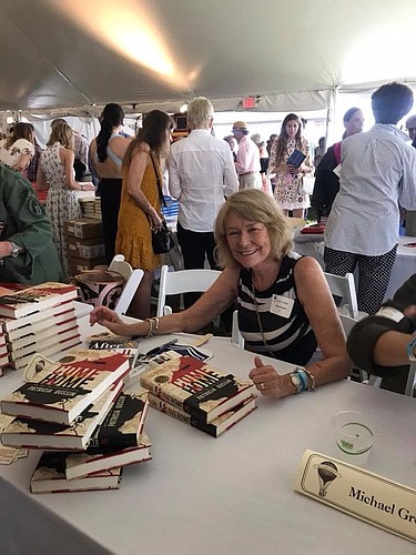 Patricia Gussin signs copies of her latest book, "Come Home." Courtesy photo