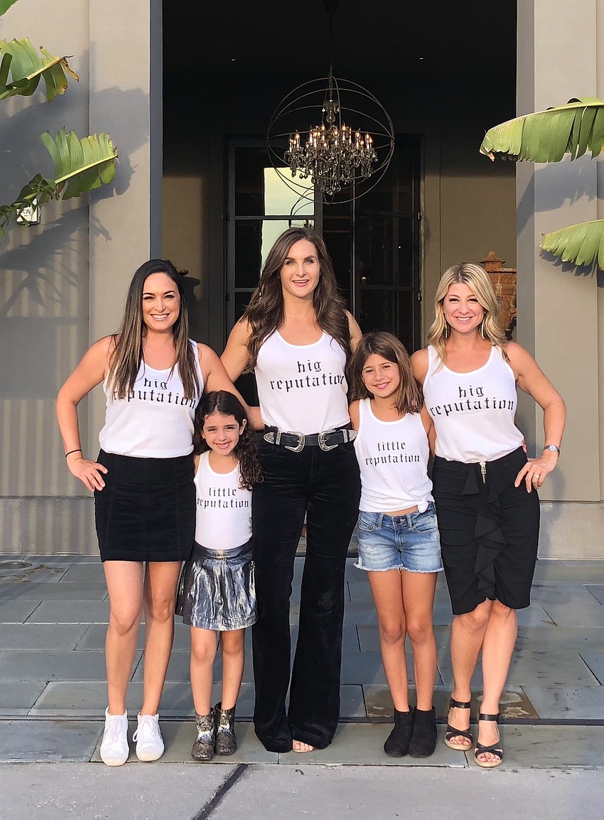 Sepi Ackerman, Ariana Ackerman, Carly Ochs, Reese Stroud and Emily Stroud rock metallics at a recent Taylor Swift concert. Courtesy photo