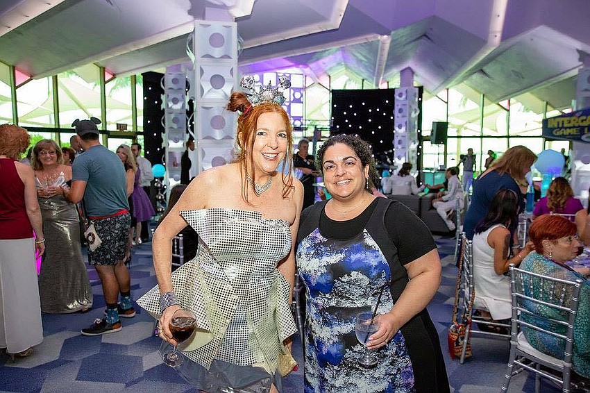 Leslie Harris-Senac and Jennifer Simms at Wedding Professionals Tomorrowland Party. Photo by Love & Style Photography
